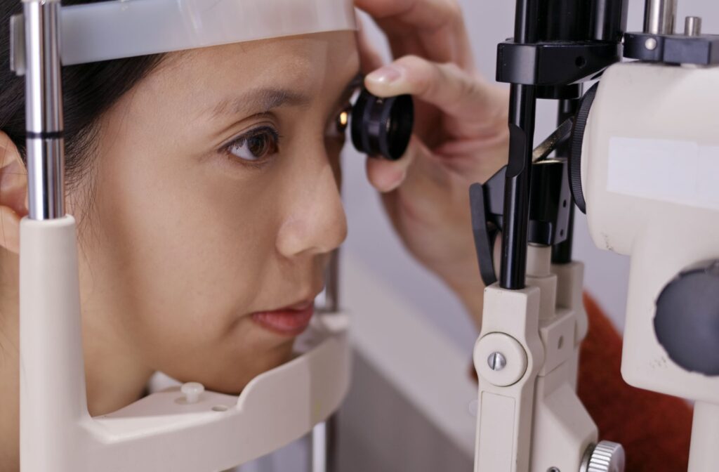 Woman undergoes an eye exam at the optometrist