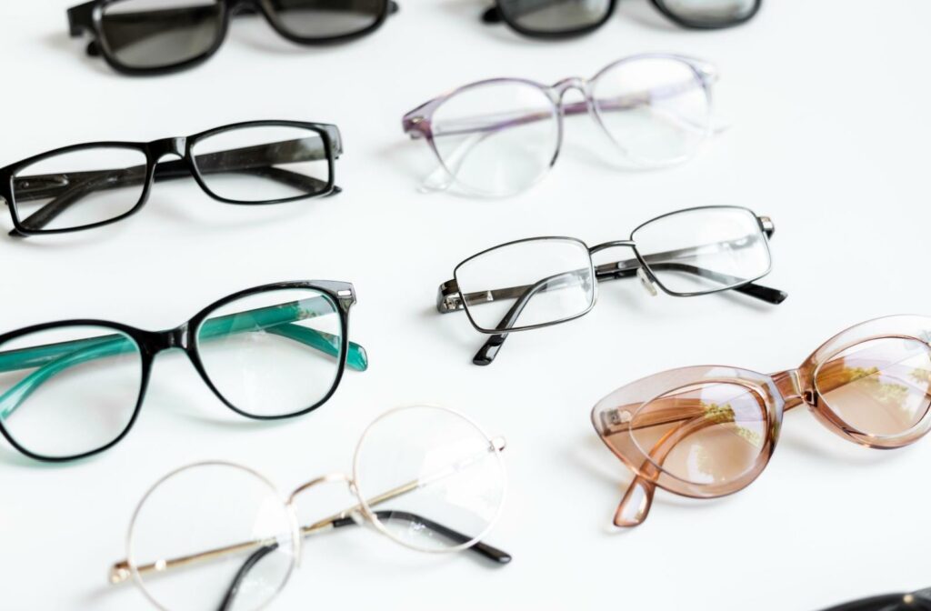 Various pairs of glasses on a table